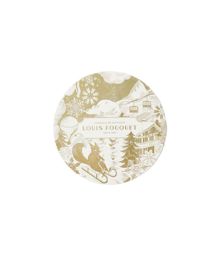 La boîte ronde de fruits enneigés