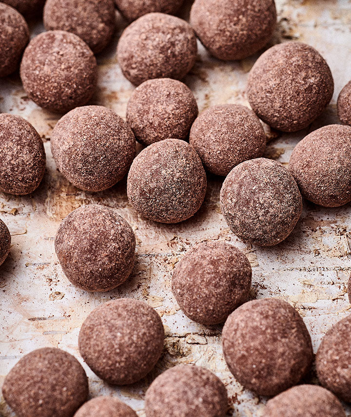 Noisettes enrobées de chocolat noir