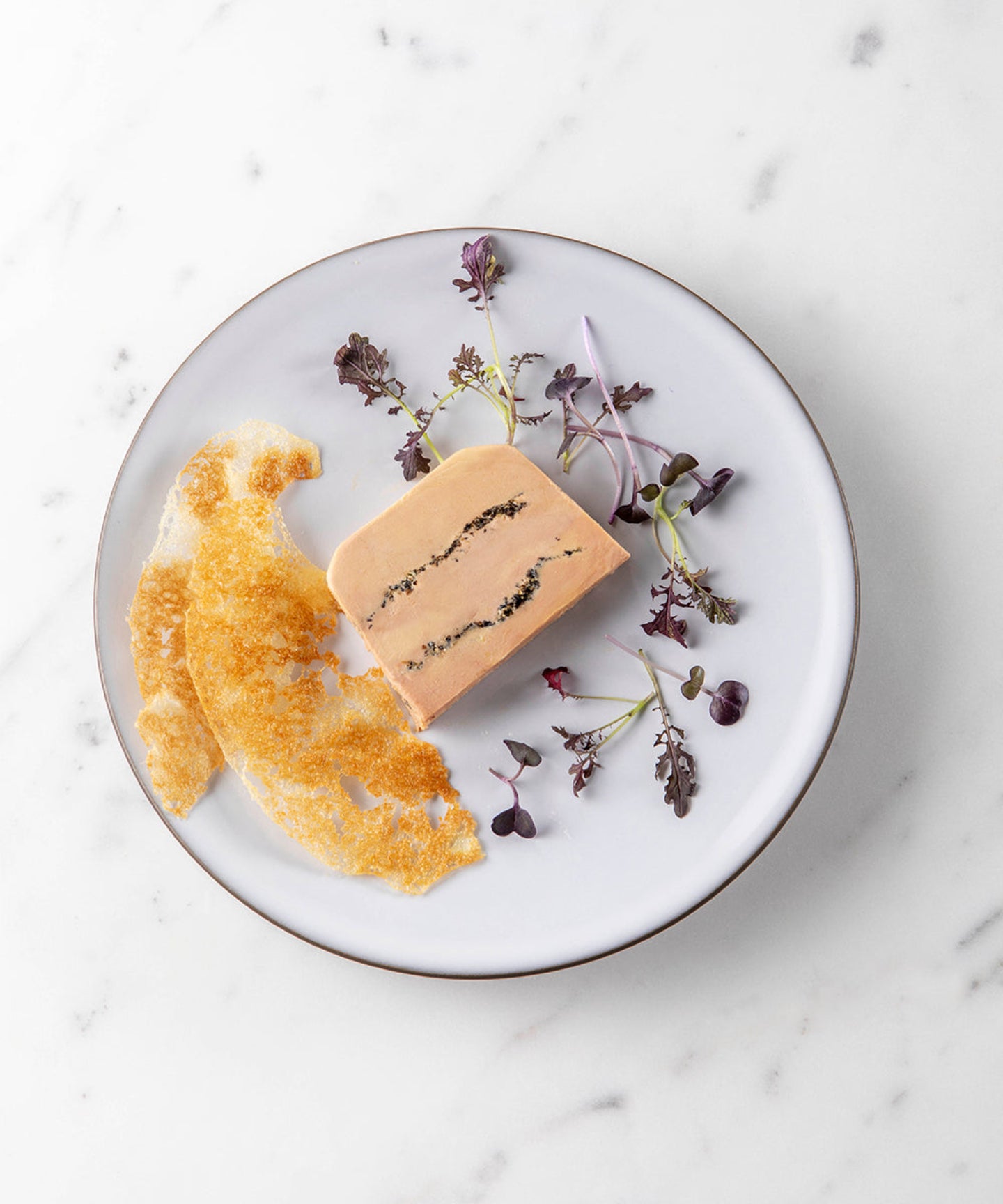 Foie gras de canard entier au champagne et aux deux poivres
