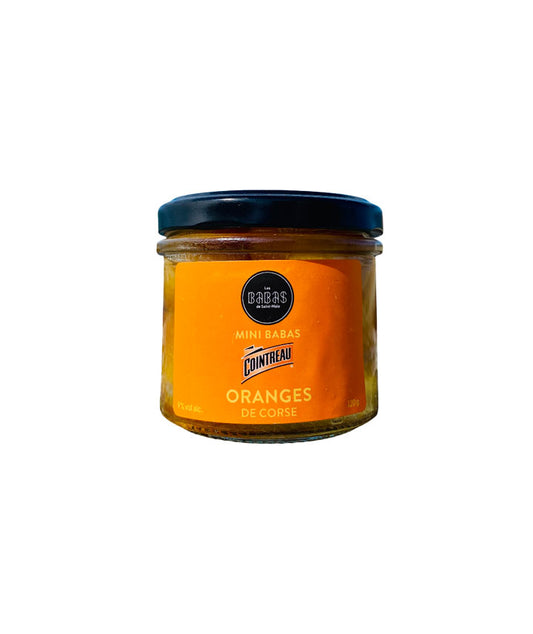 Mini babas cointreau et orange vue face aux Galeries Lafayette Le Gourmet