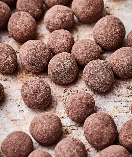 Noisettes enrobées de chocolat noir