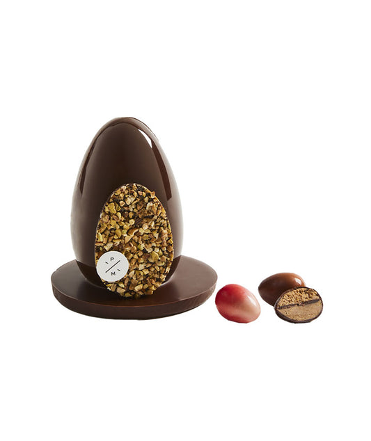 Oeuf de Pâques au chocolat noir, paré de fruits secs et rempli d'oeufs pralinés - Petit format