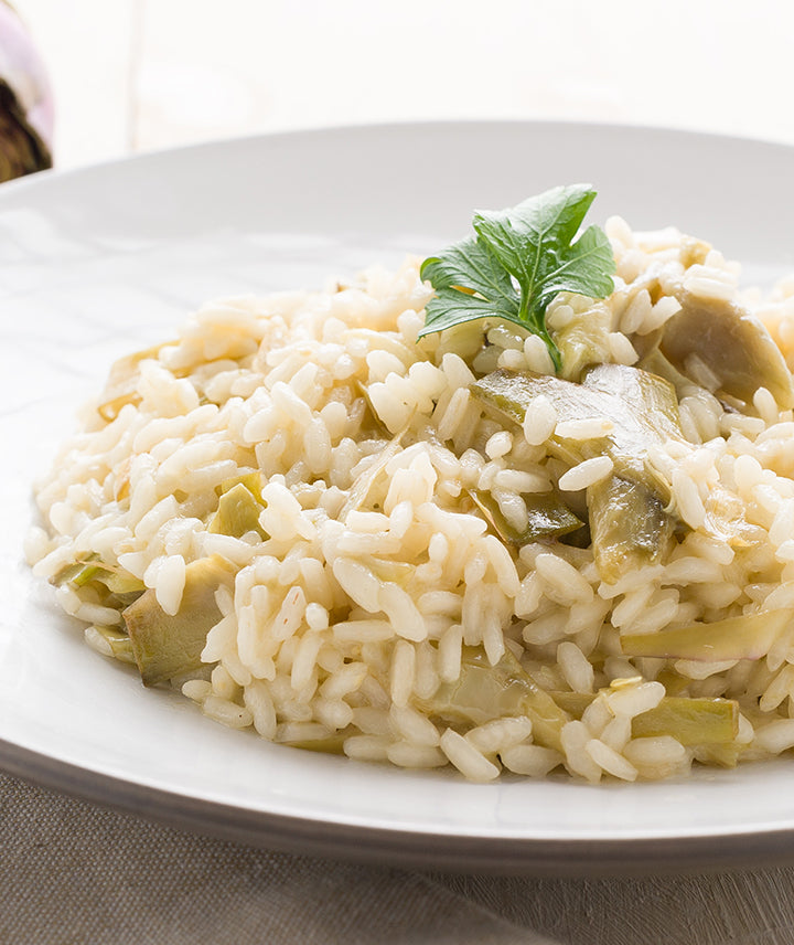 Risotto préparé aux artichauts